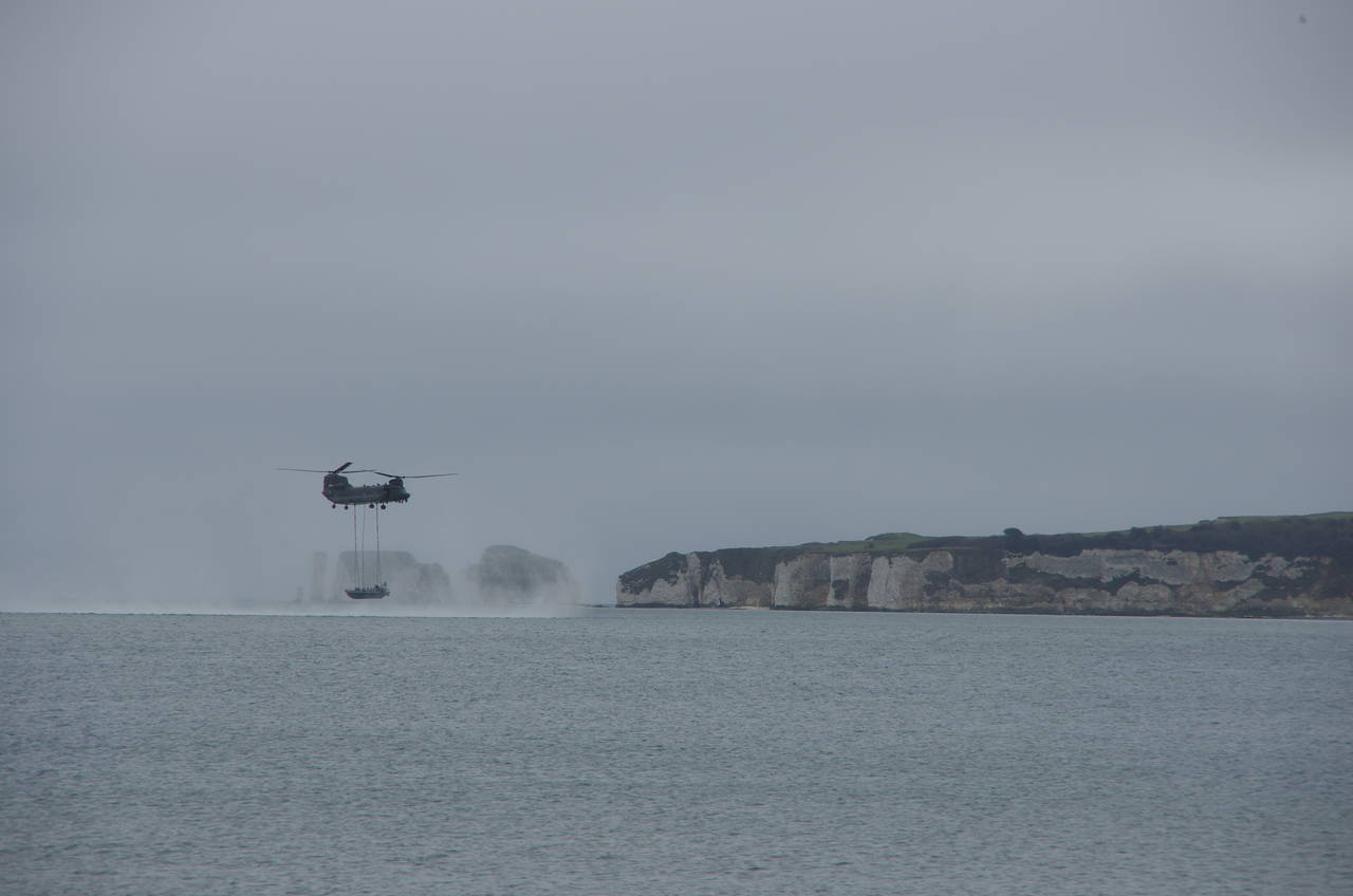 Military helicopter over Studland Bay